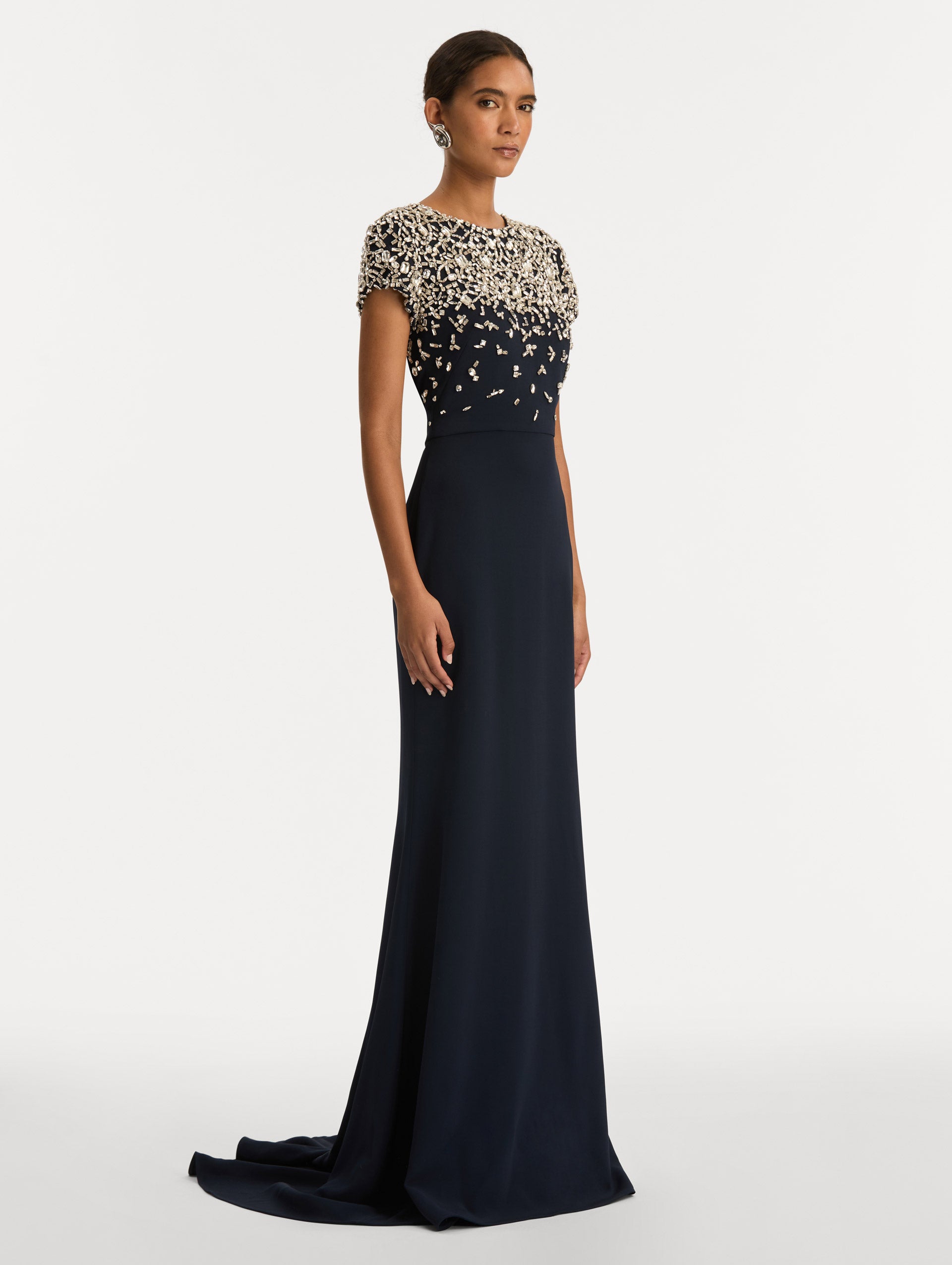 Navy Mosaic Crystal Embroidered Cady Gown with fitted embellished bodice and short sleeves. Side View.