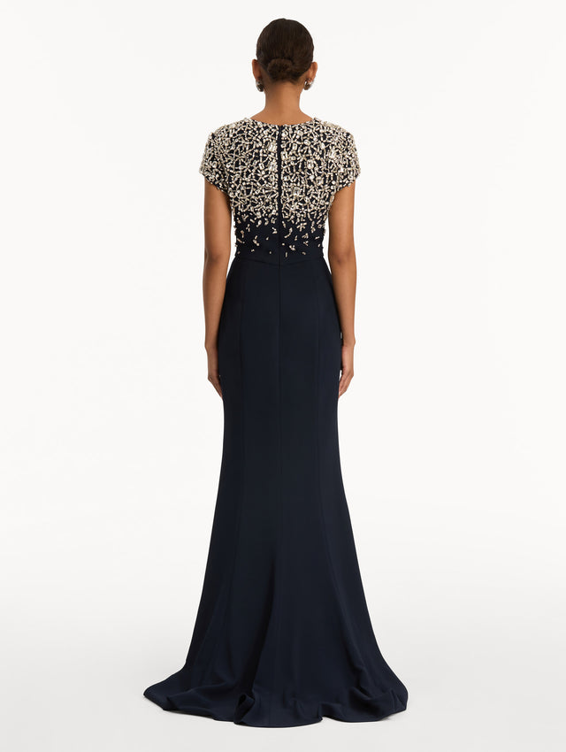 Navy Mosaic Crystal Embroidered Cady Gown with fitted embellished bodice and short sleeves. Back View.