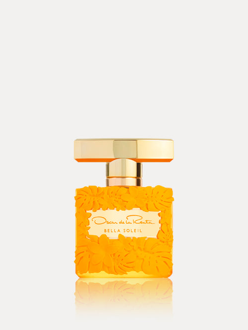 Bella Soleil Fragrance. Bottle is orange with floral motifs, gold spray. Front view.