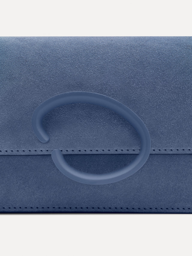 Blue O Pochette in Suede with gold strap and blue abstract O Clasp. Zoom View. 
