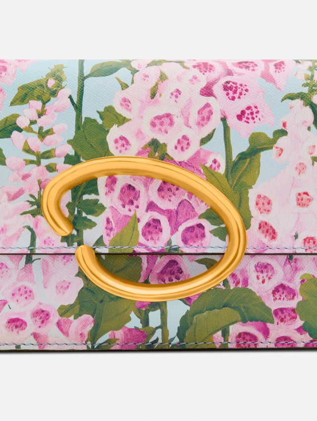 Pink, blue, and green Foxlove Printed O Pochette with gold hardware and abstract O Clasp. Zoom View. 
