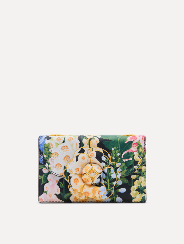 Floral Foxglove Printed TRO Bag with gold Hardware and Flower detail. Front View.