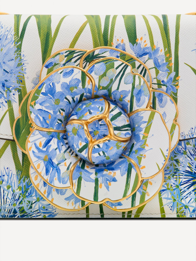 White, blue and green Allium Printed TRO Bag with gold hardware and flower embellishment. Zoom View.