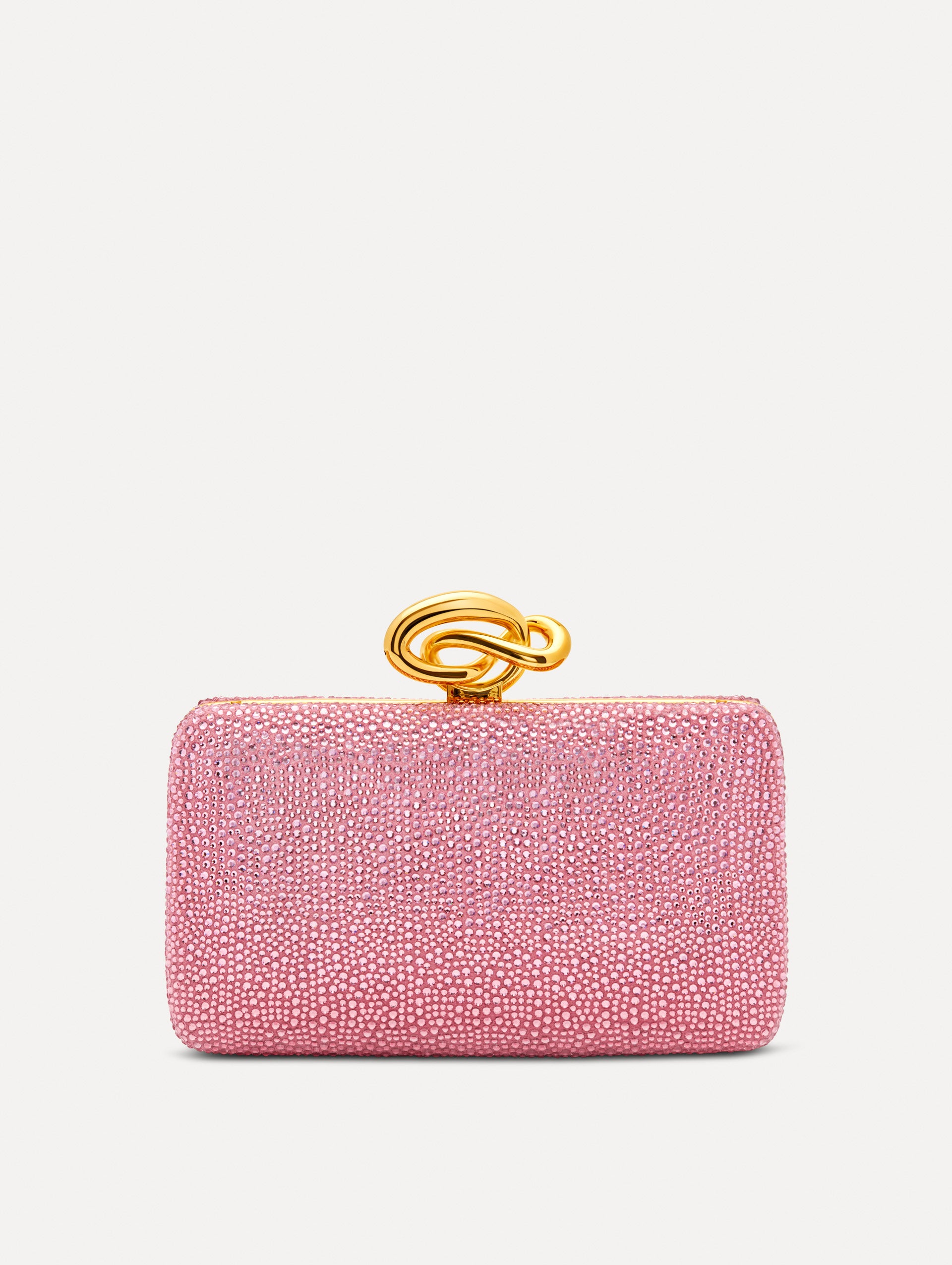 Pink Crystal Pavé Knot Minaudière featuring a rectangular silhouette, allover pavé embellishment, and sculptural gold knot clasp.