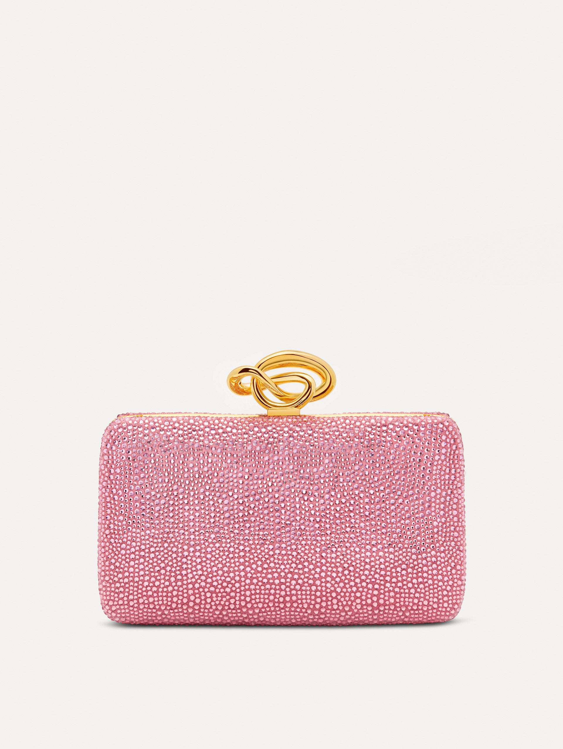 Pink Crystal Pavé Knot Minaudière featuring a rectangular silhouette, allover pavé embellishment, and sculptural gold knot clasp.