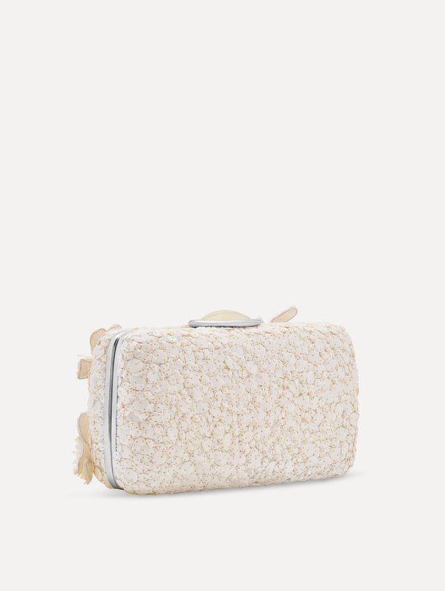 White Cherry Blossom Embroidered O Minaudière featuring a rectangular silhouette, beaded surface, and oversized three-dimensional flower embellishments.