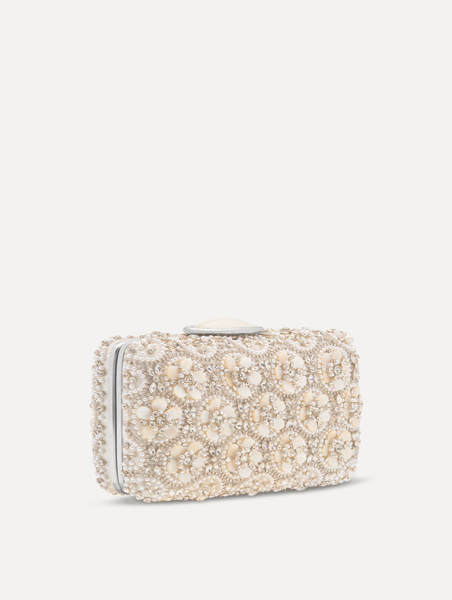 Ivory Mother of Pearl Embroidered O Minaudière featuring ivory beaded flowers, crystal detailing, and a structured rectangular silhouette with top clasp closure. Side View.