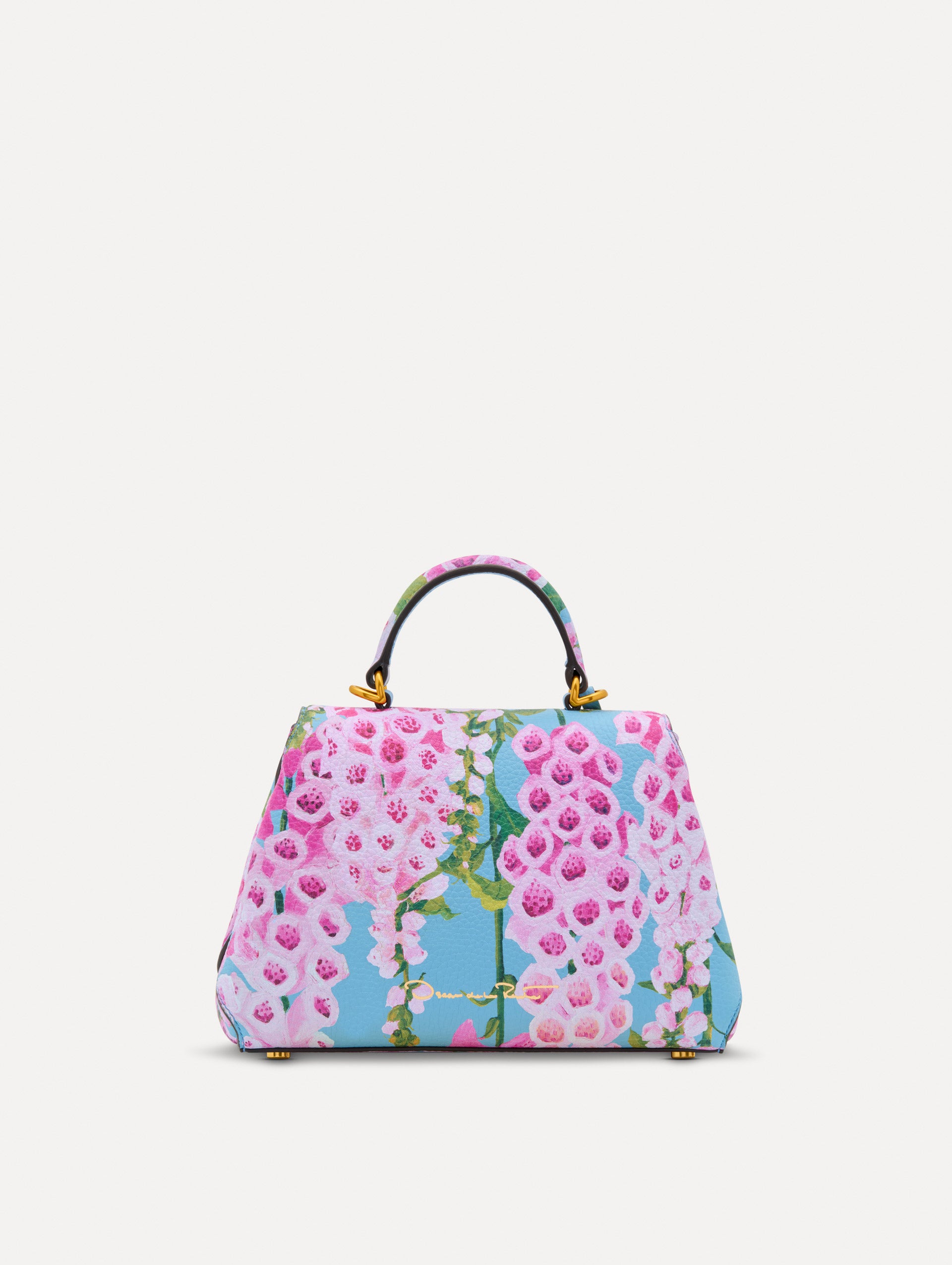 Blue, green, and pink Foxlove printed Mini Poppy with gold hardware. Back View.