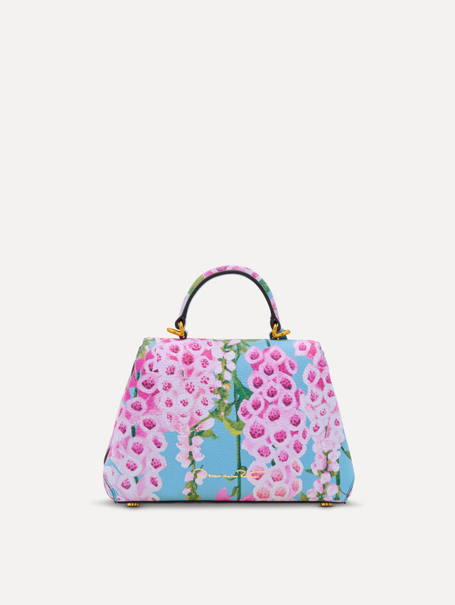 Blue, green, and pink Foxlove printed Mini Poppy with gold hardware. Back View.