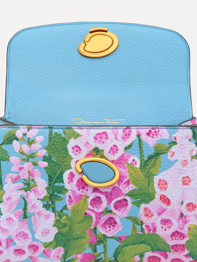 Blue, green, and pink Foxlove printed Mini Poppy with gold hardware. Zoom View.