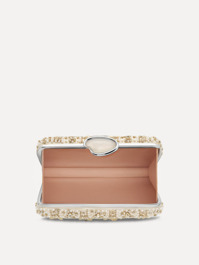 Ivory Mother of Pearl Embroidered O Minaudière featuring ivory beaded flowers, crystal detailing, and a structured rectangular silhouette with top clasp closure. Top View.
