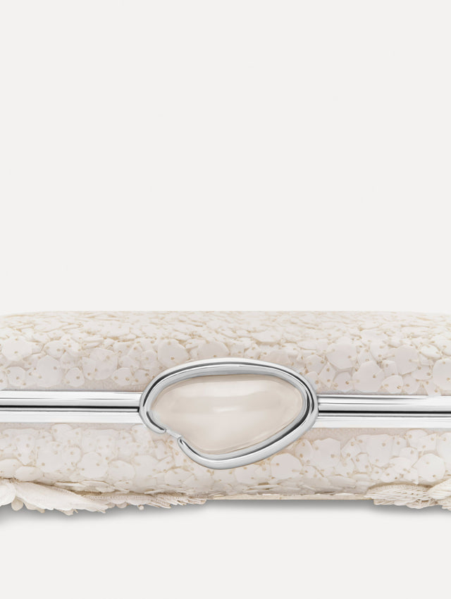 White Cherry Blossom Embroidered O Minaudière featuring a rectangular silhouette, beaded surface, and oversized three-dimensional flower embellishments.