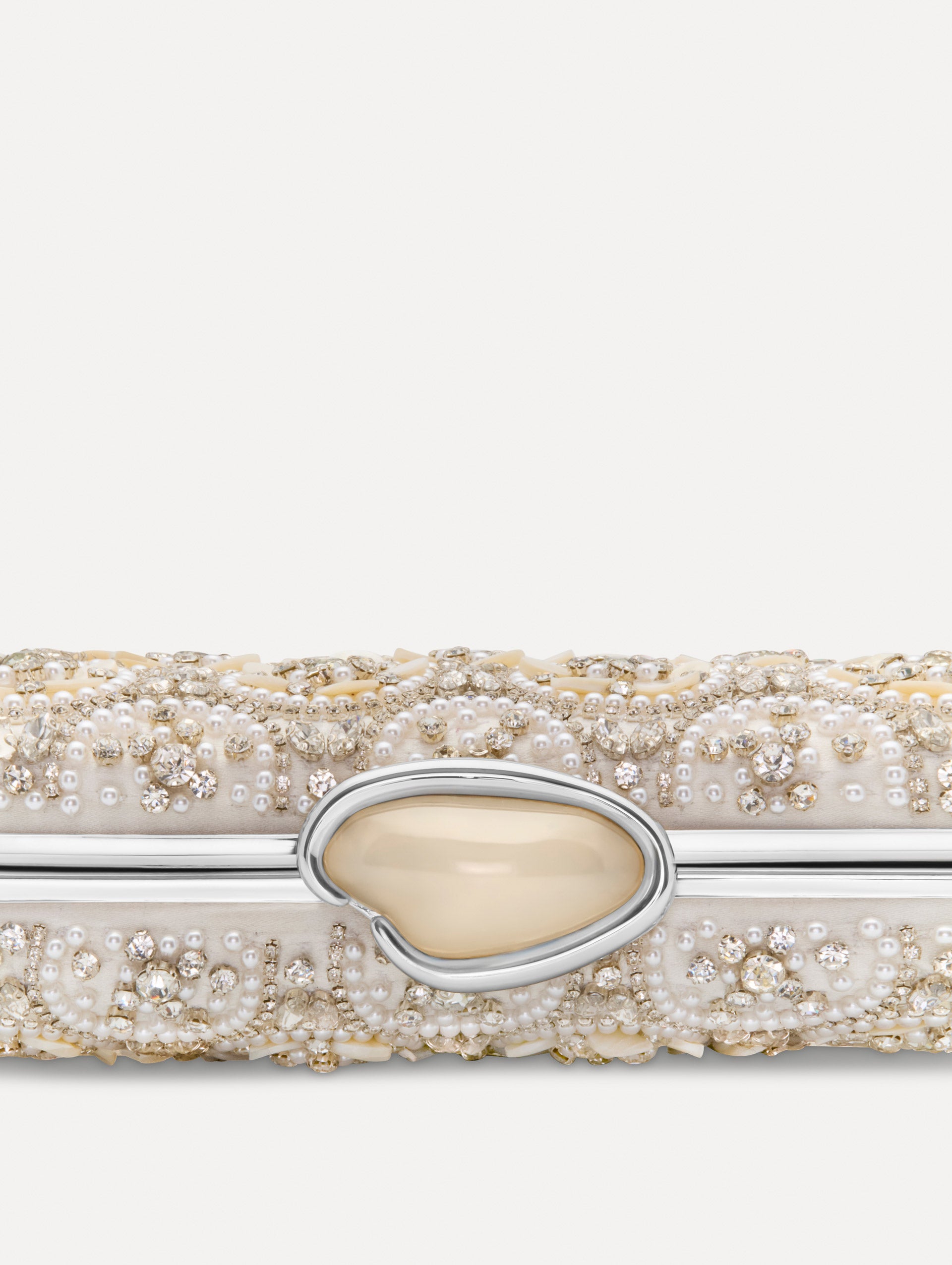 Ivory Mother of Pearl Embroidered O Minaudière featuring ivory beaded flowers, crystal detailing, and a structured rectangular silhouette with top clasp closure. Zoom View.