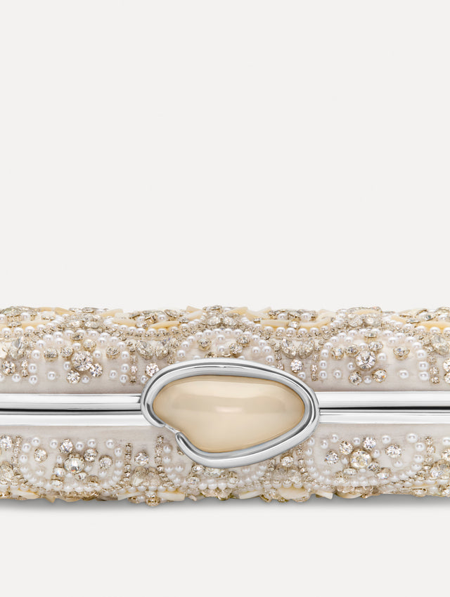 Ivory Mother of Pearl Embroidered O Minaudière featuring ivory beaded flowers, crystal detailing, and a structured rectangular silhouette with top clasp closure. Zoom View.