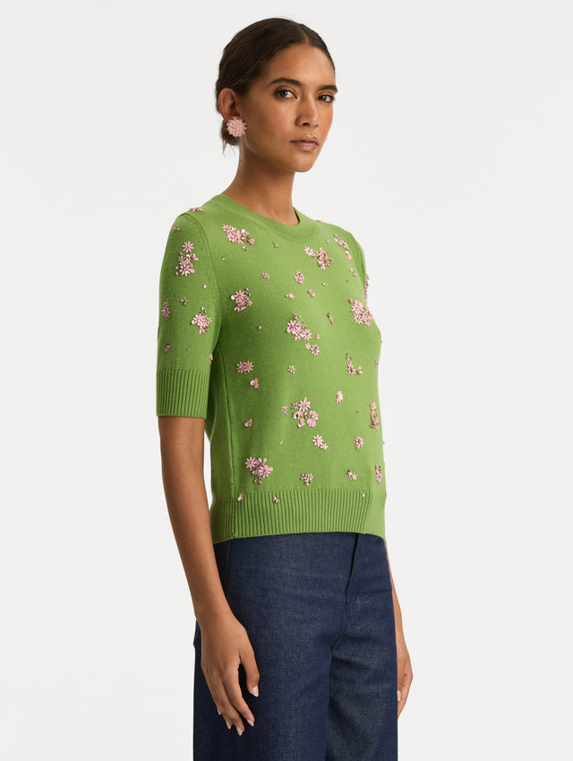 Green Crystal Cluster Embroidered Pullover with elbow length sleeves and pink crystal applique. Side View.
