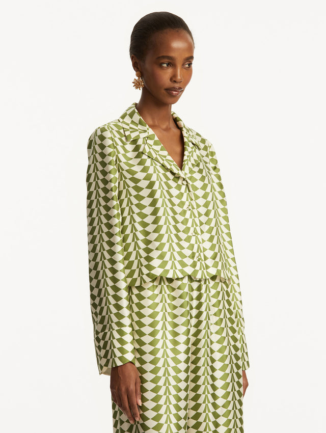 Green and white geometric print silk blouse. Side View.