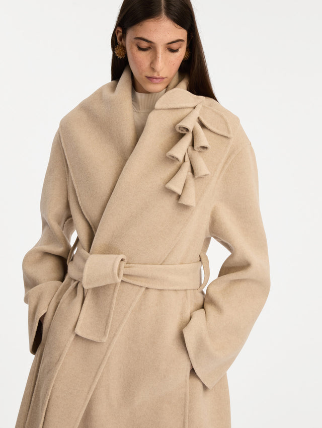 Beige Foxglove Embroidered Wool Coat with floral detail on the lapel and thick wool belt. Zoom View.