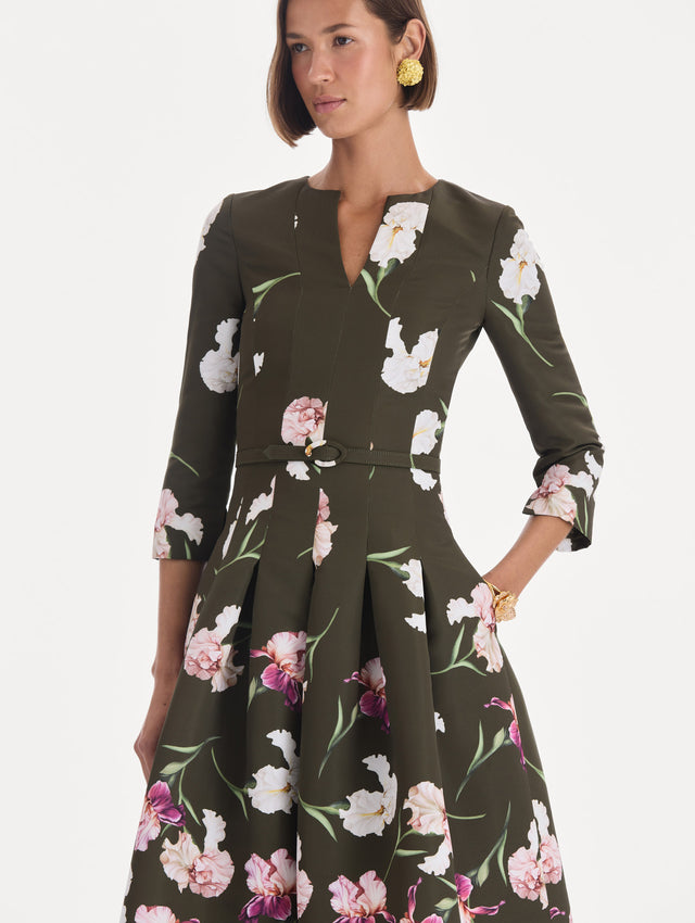 The model is wearing a long sleeve painted iris degrade faille cocktail dress. Zoom view.