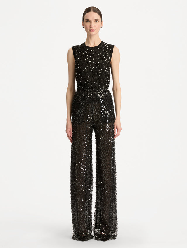 Black Floating Sequin Pant with high waist and wide leg silhouette. Front View. 
