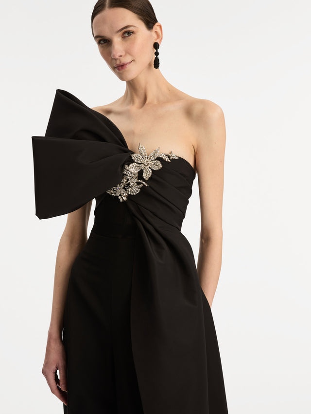Black Crystal Embroidered Bow-Detailed Blouse with oversized bow detail and crystal floral embellishment. Zoom View.