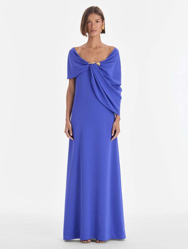 The model is wearing an off shoulder draped detail georgette caftan. Front view.