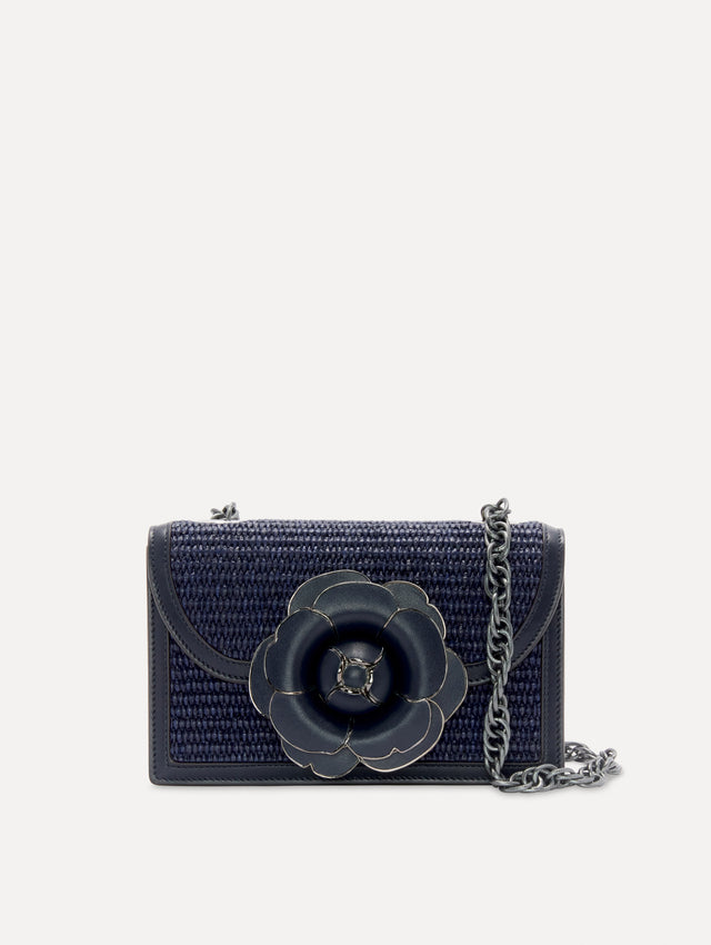Raffia Woven TRO Bag in Navy with detachable silver shoulder strap. Front View