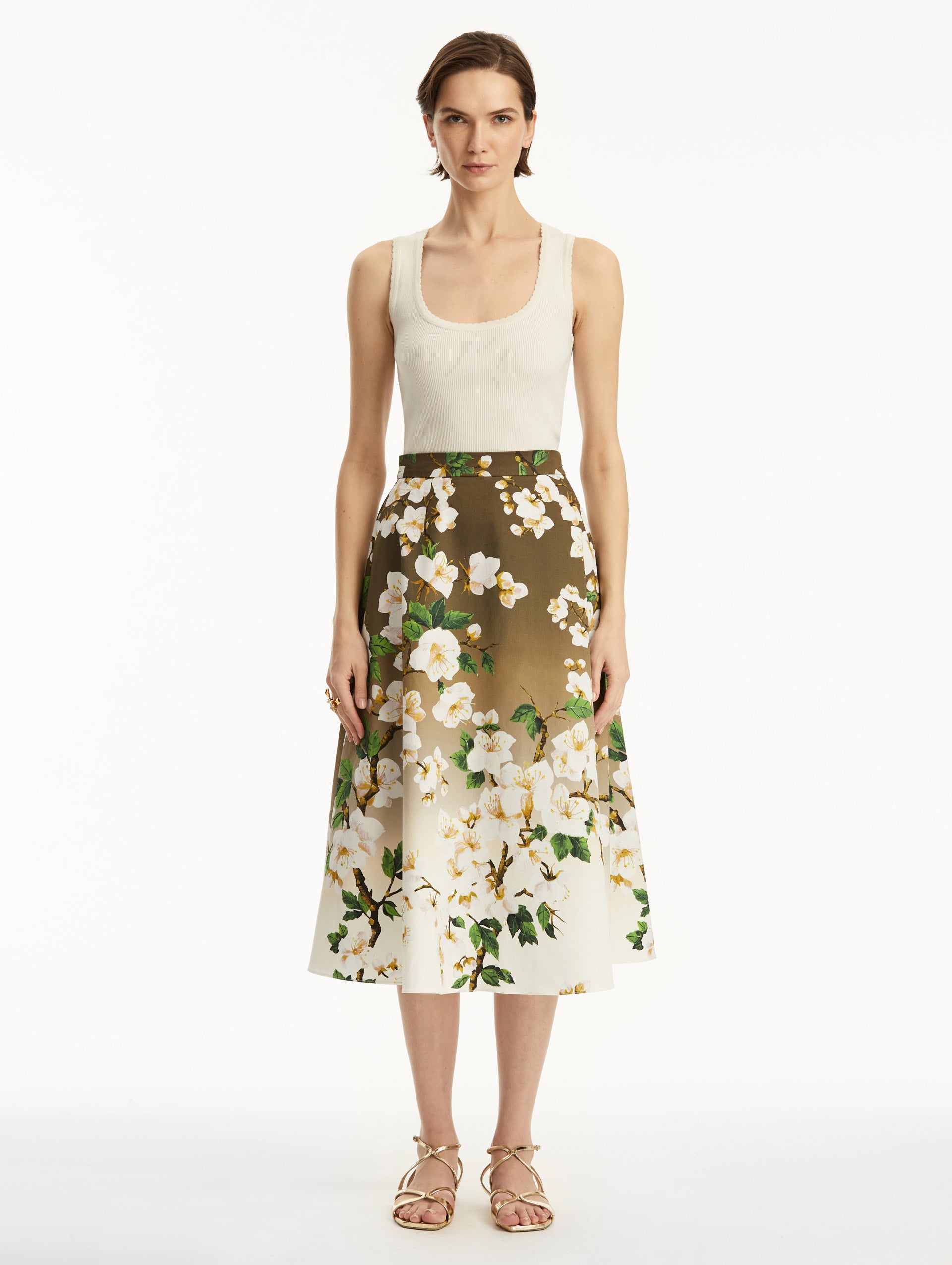 Full body front view of ombre khaki to white cherry blossom printed skirt.