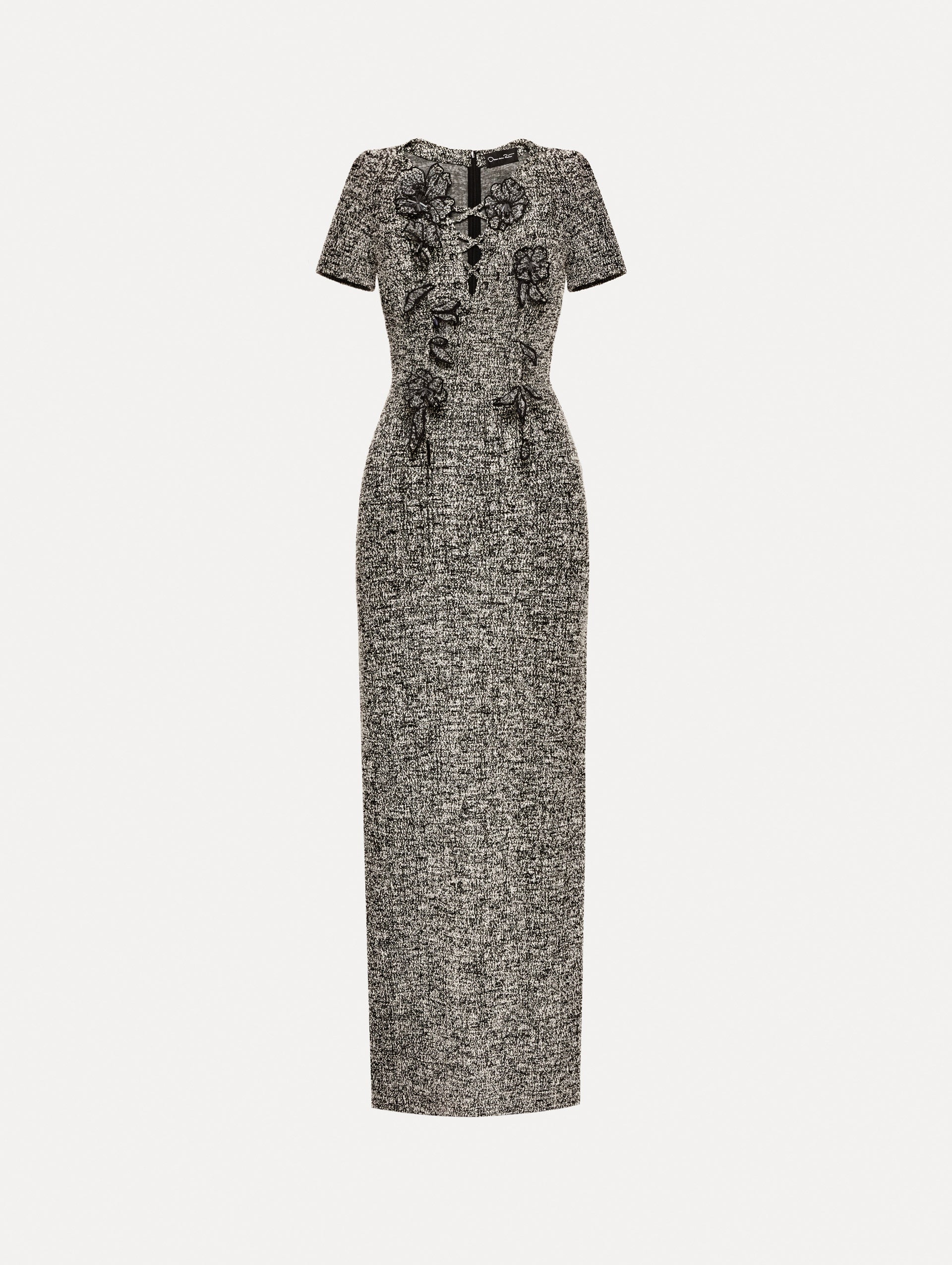 Short sleeve black and ivory tweed dress with floral appliques and lace up neckline. 