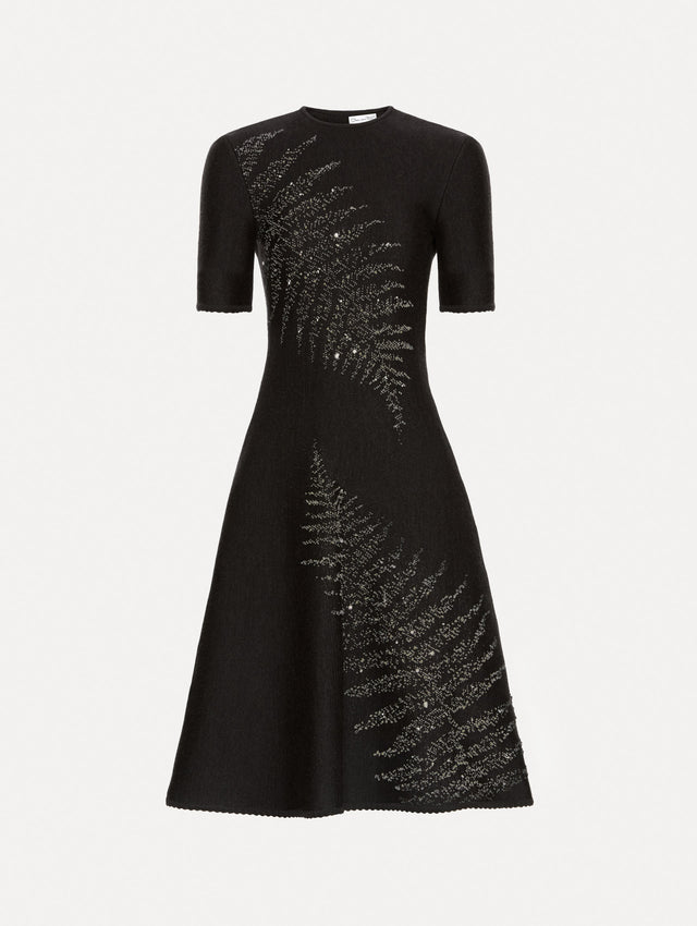 Charcoal short sleeve dress with silver sequin fern embroidery. Front View.