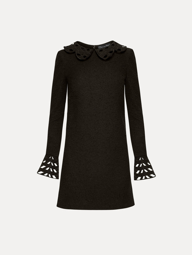 Black tweed long sleeve mini dress with threadwork cutouts at the scalloped collar and cuffs. Front view