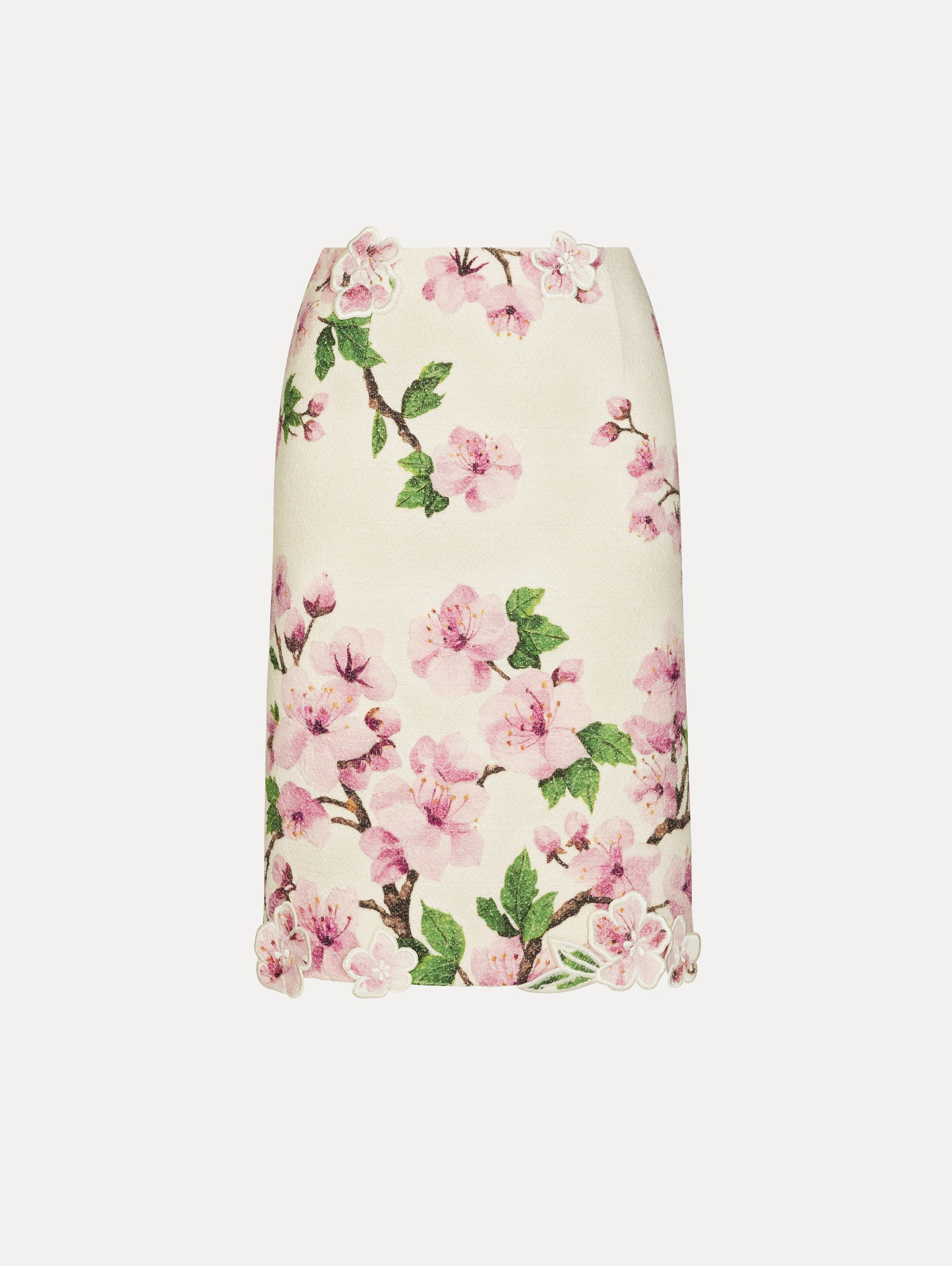 Ivory Cherry Blossom Tweed Pencil Skirt with pink and green floral motifs and knee length hem. Front View.