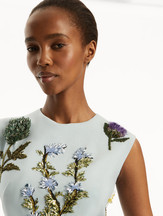 Sleeveless mini cocktail dress in light blue with embroidered crystal flowers and artichokes. Zoom view