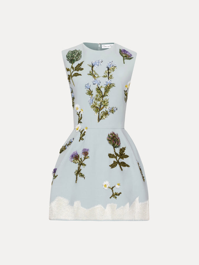Sleeveless mini cocktail dress in light blue with embroidered crystal flowers and artichokes. Front view