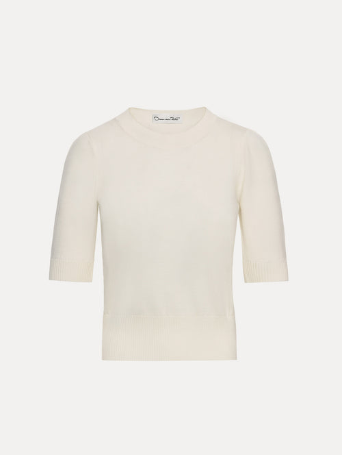 Ivory Short Sleeve Wool Pullover with ribbed neckline and hem. Front View.