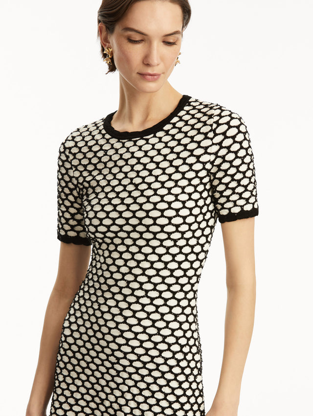 Black and white honeycomb print sequin knit short sleeve mini dress. Zoom view