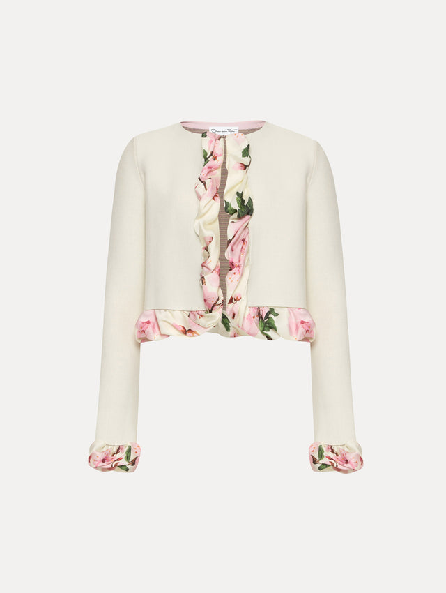White cardigan with pink bubble twist trim printed with cherry blossoms