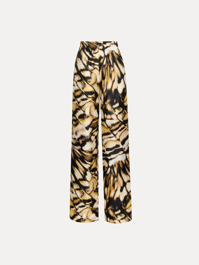 Abstract butterfly print in tones of yellow, brown/black, and white silk pants.
