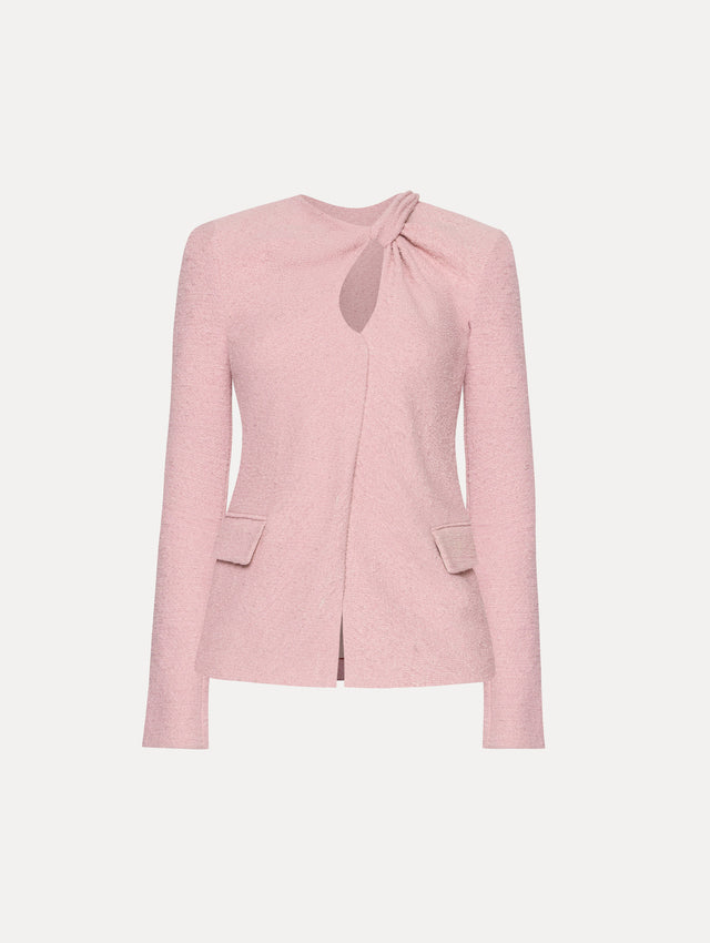 Light pink tweed jacket with a twist detail in the top corner.