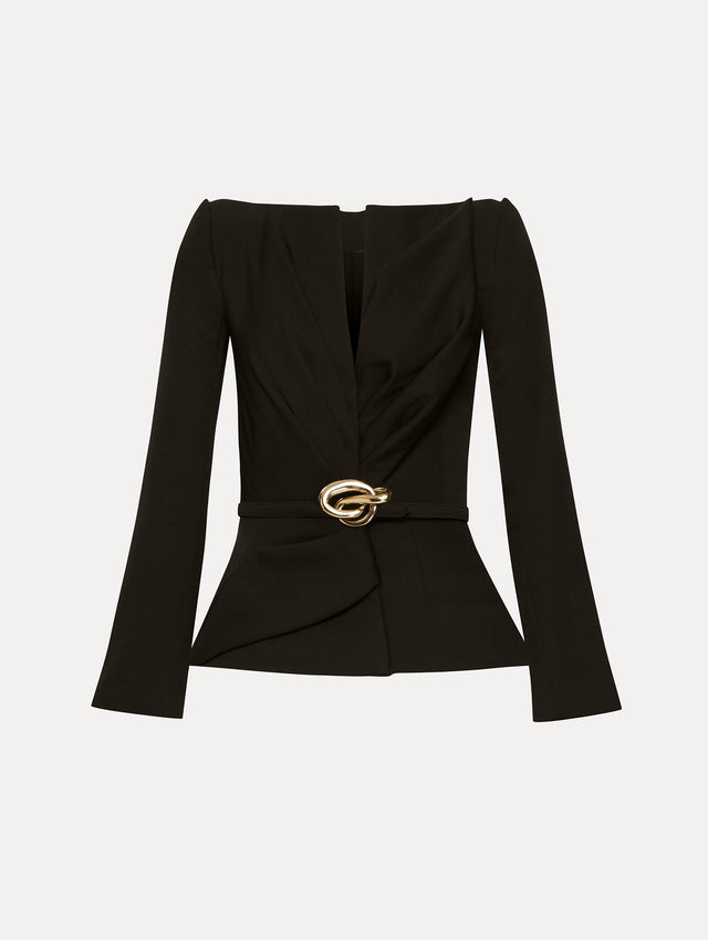 Black suiting jacket with V-neckline, long sleeves, and subtle gathering at the waist. With a sculptural gold-tone knotted belt at the waist. 