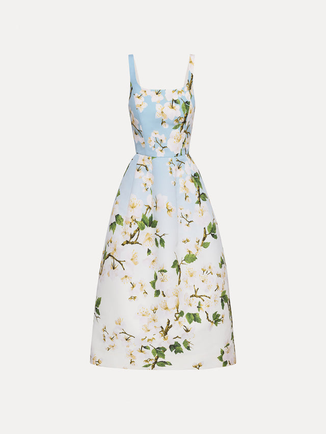 Front view of cherry blossom dress with a blue to white ombre. 