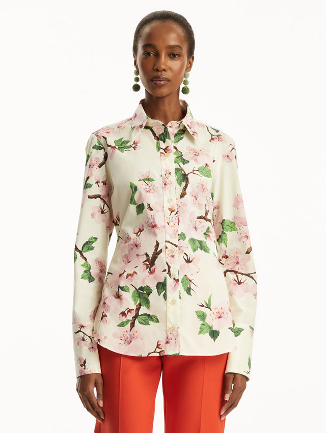 The Cherry Blossom Cotton Poplin Blouse in a floral print. Front View. 