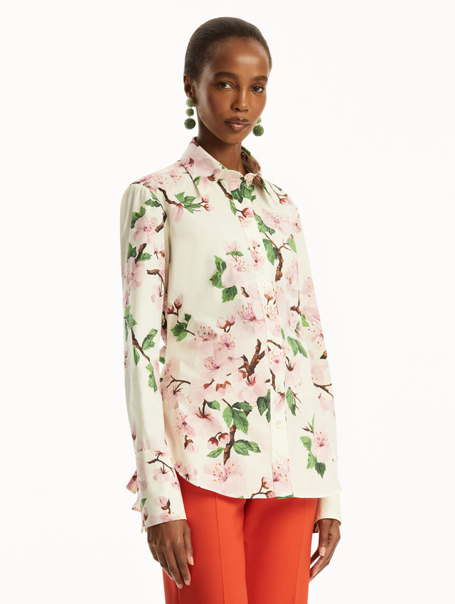 The Cherry Blossom Cotton Poplin Blouse in a floral print. Side View.