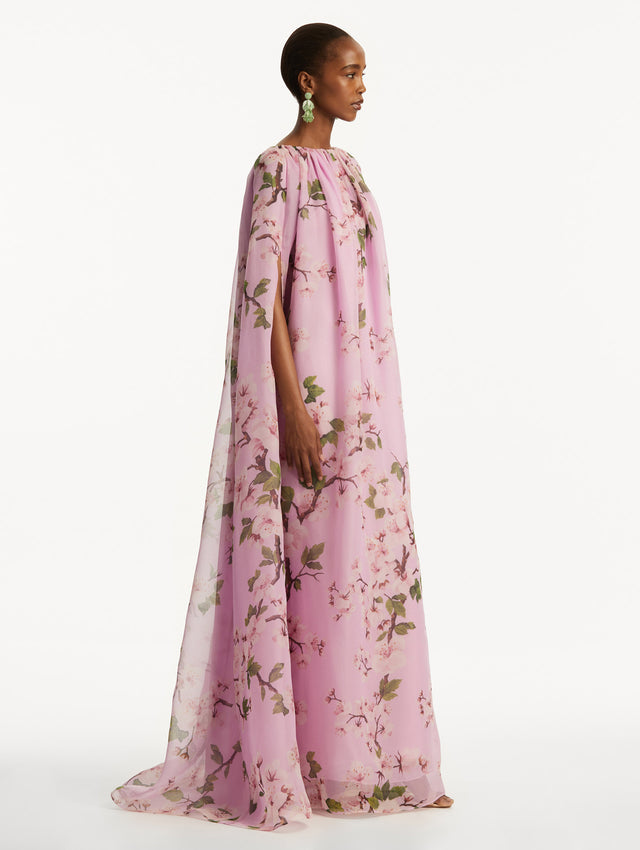 Model wearing pink cherry blossom caftan. Side View.