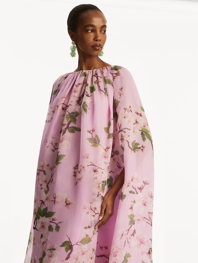 Model wearing pink cherry blossom caftan. Zoom View.