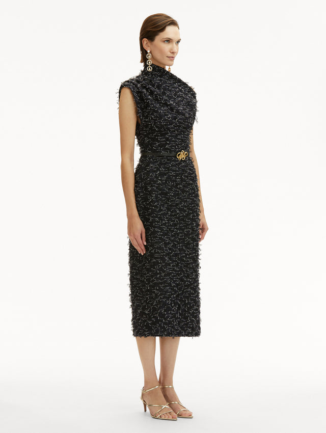Eyelash Tweed Off-the-Shoulder Pencil Midi Dress in Black with Belt that has a Gold Flower Side View