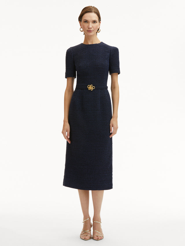 Navy Tweed Midi Dress with Short Sleeves and Round Neckline with a Matching Belt with Gold Flower Motif. Front View