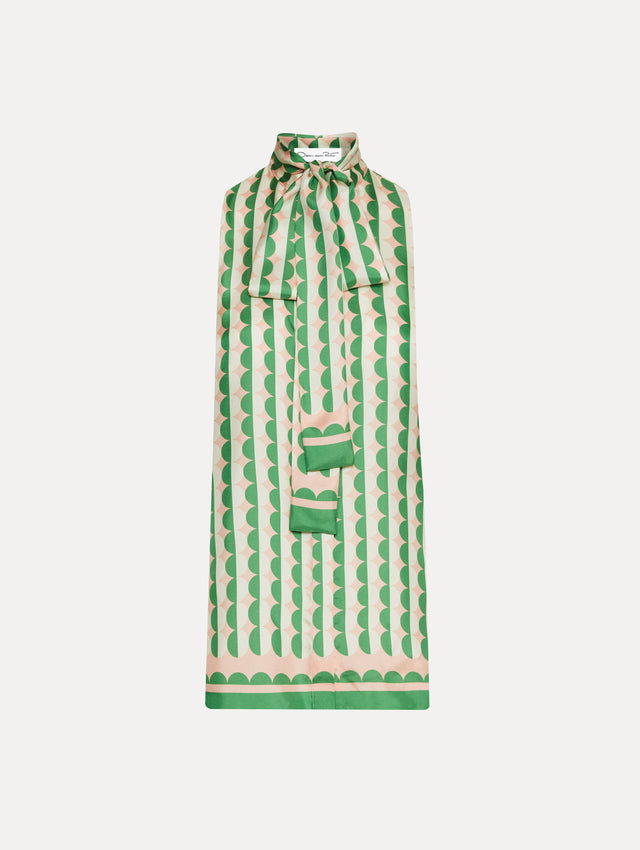 Geometric Circle Silk Twill Sleeveless Blouse that Ties in the Front with Light Pink Background and Half White Half Green Circle Print Front View