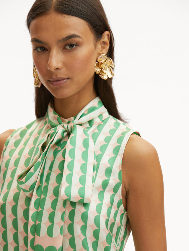 Geometric Circle Silk Twill Sleeveless Blouse that Ties in the Front with Light Pink Background and Half White Half Green Circle Print Zoom View