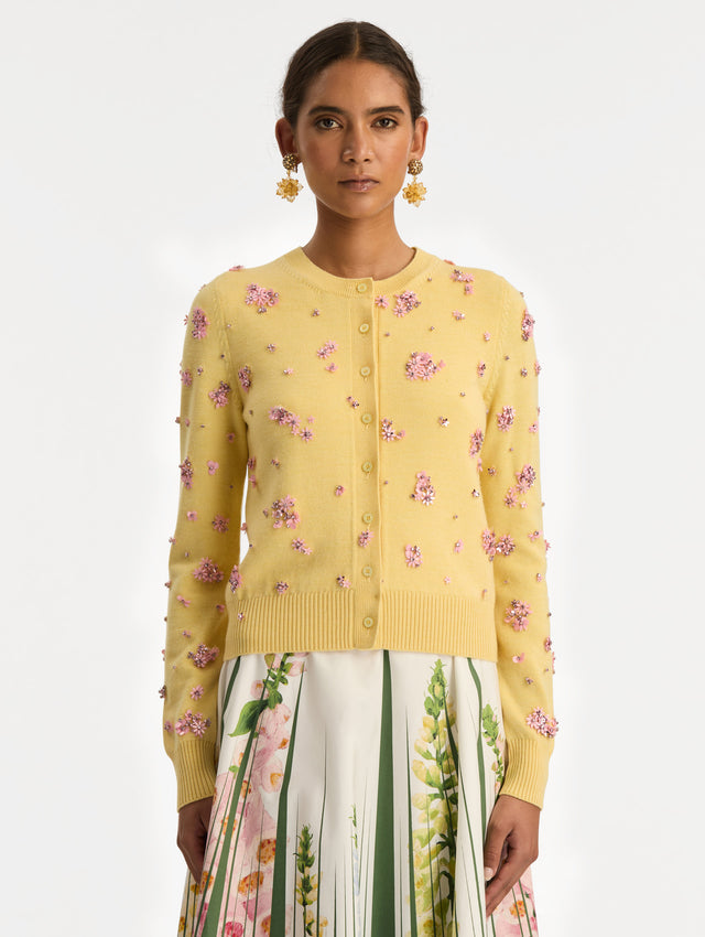 Yellow Crystal Cluster Embroidered Cardigan with pink crystal applique. Front View.