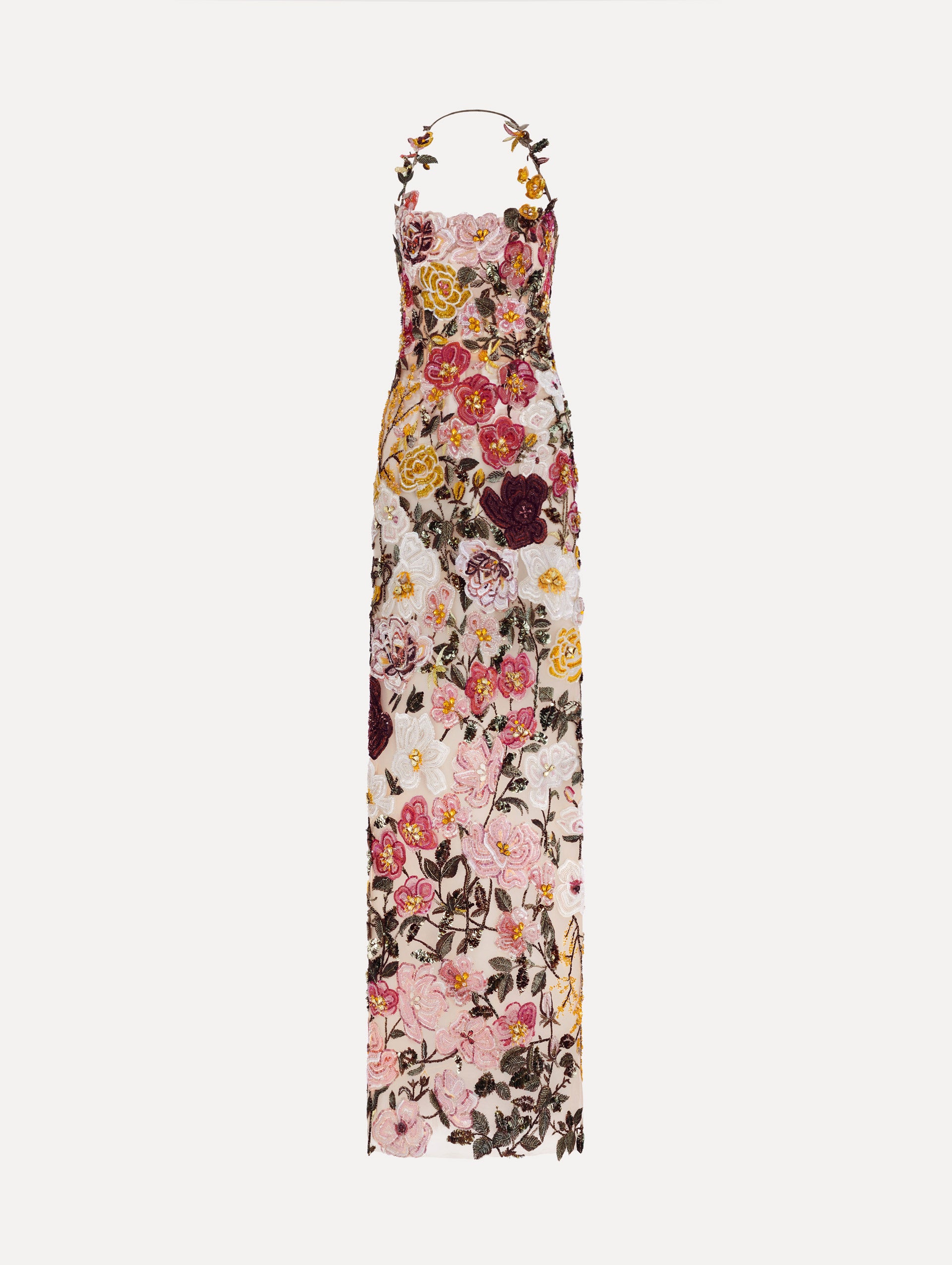 The model is wearing the beaded mixed botanical embroidered gown in multi-color with a halter neckline and floral detailing.